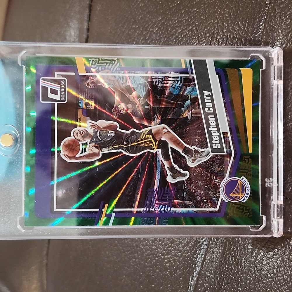 Stephen Curry 2023-24 Donruss Holo Green Laser. Warriors